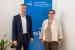 Alexander Rieper e Ulrike Tappeiner davanti al roll-up unibz.