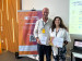 Joyce Correna Carlo (right) receives the awards from Roberto Lamberts, a board member from IBPSA-Brasil.